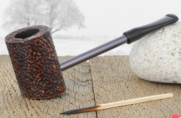 Nording Compass pipe with a rusticated briar of a brown color